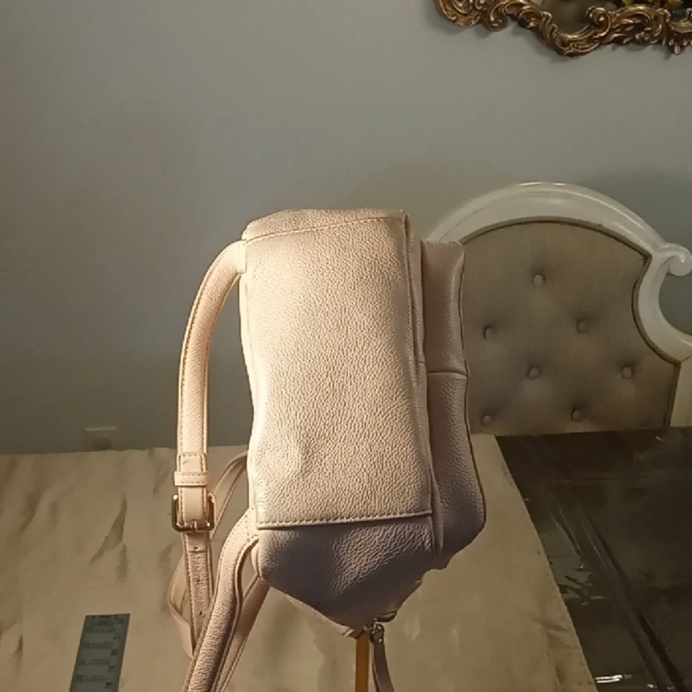 Kate Spade Elegant Pink Cream Backpack with gold Hardware